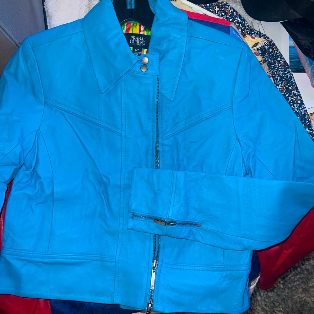 Collectors leather blue jacket never worn NWOT, deep blue, cool interior, small